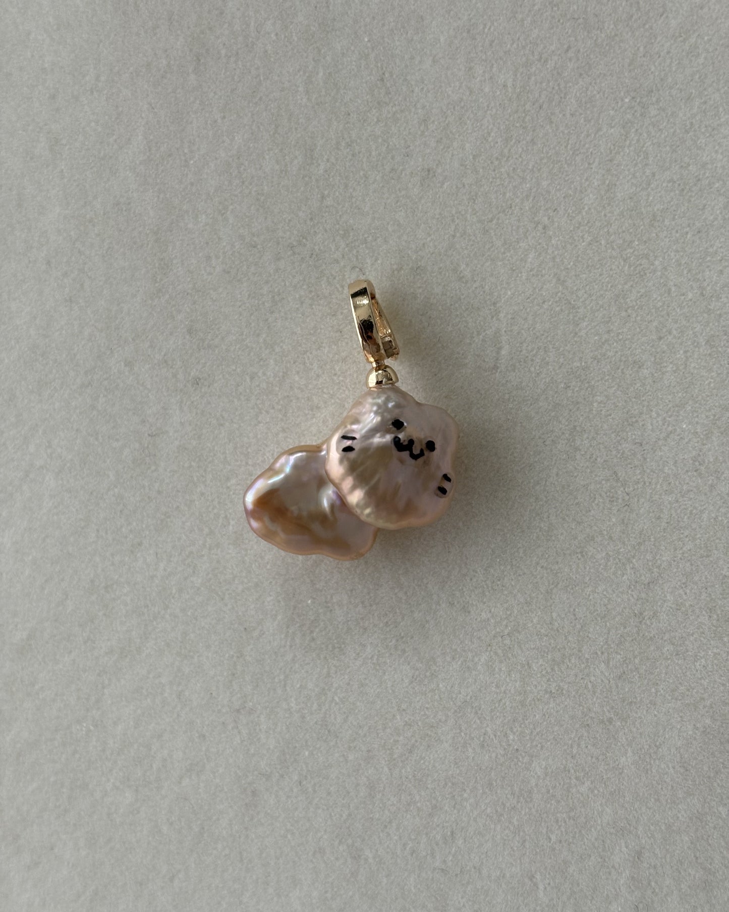 Handmade freshwater pearl cat pendant